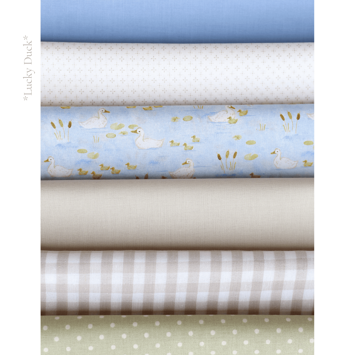 Close-up of Lucky Duck birthday garland by Social Heirloom – soft cotton letters in blue, green, gingham, and duck print with white ruffle bows, ideal for boys’ birthdays or ‘One Lucky Duck’ themed celebrations