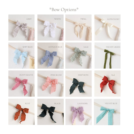 Bow color chart for Social Heirloom name garlands, 16 ruffle and velvet options: grey, white, twill, satin ivory, soft blue, antique blue, sage, velvet green, dusty mauve, pink blush, deep moss, red, rust, black, lavender, and velvet blue.