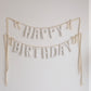 Neutral handmade ‘Happy Birthday’ fabric banner with twill bows – soft cotton garland for birthdays, nurseries, or keepsake gifts by Social Heirloom