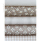 Antique Birch fabric palette by Social Heirloom – soft neutrals in cream, taupe, and warm brown tones with floral, gingham, and striped prints, used for handmade birthday and name garlands with a timeless, heirloom feel