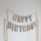 Custom mix Happy Birthday garland in mixed blue stripes, florals and blush fabrics, handmade by Social Heirloom